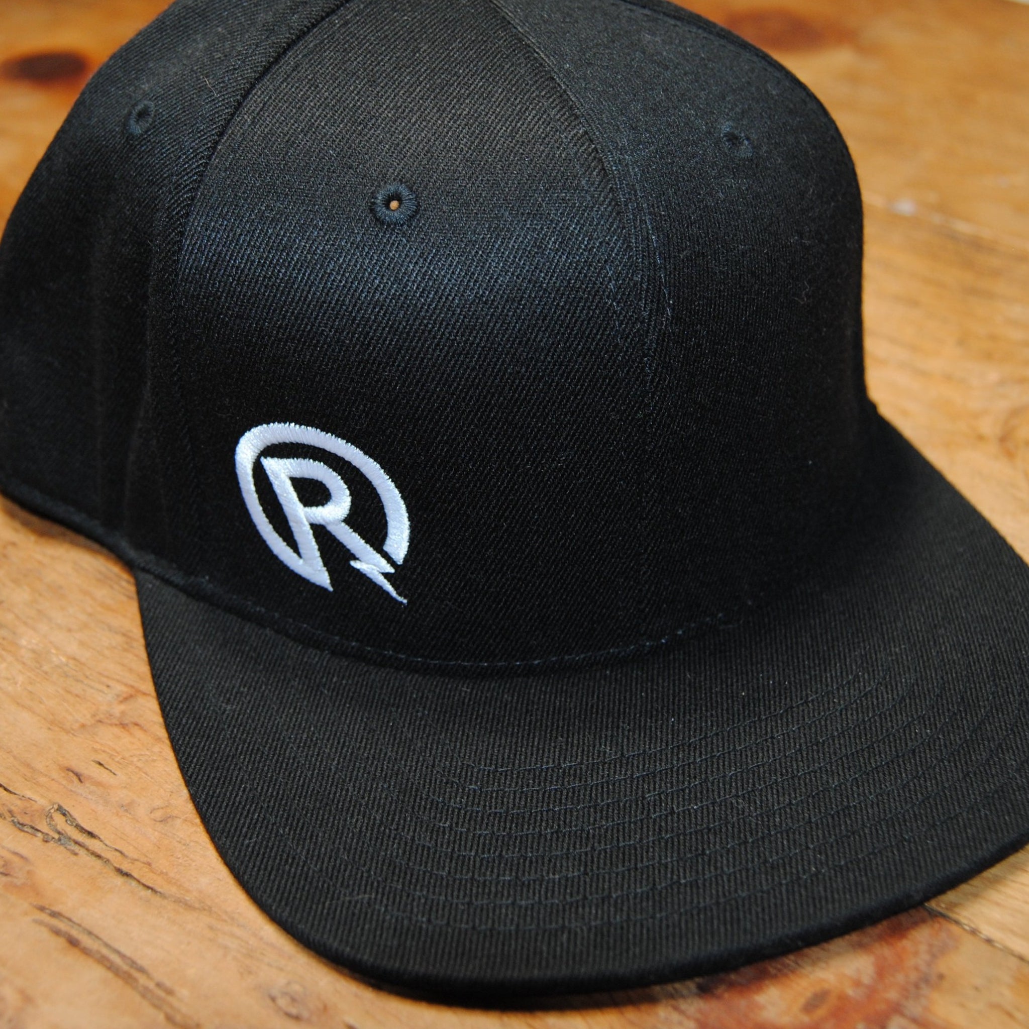 R-volt embroidered, #IDISSENT snap back hat